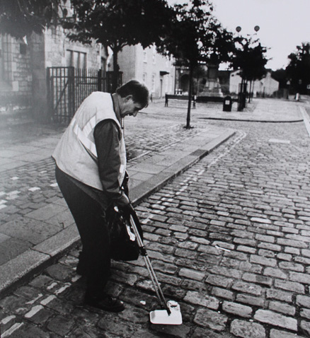 <h2>CLEANING UP AFTER MARKET DAY</h2><p class='caption'></p>